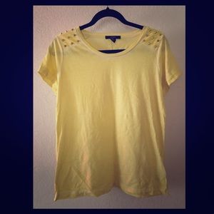 Yellow tee, with gold spiked shoulders